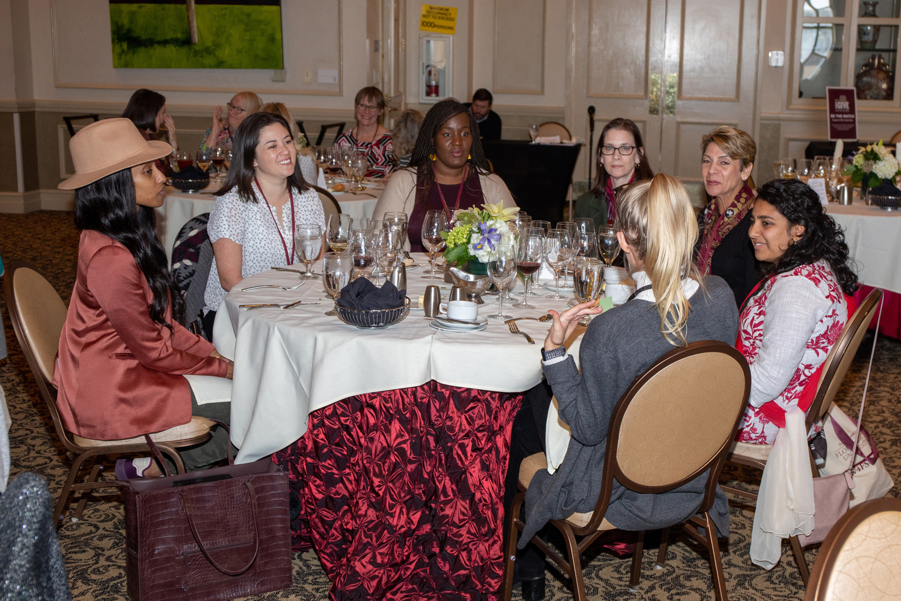 A group of women sitting around a table